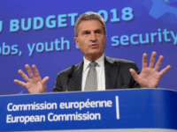 Gunther Oettinger European Union (EU) Commissioner for Digital Economy and Society Gunther Oettinger speaks during a press conference announcing the EU Commission's proposal for the EU Budget 2018 on May 30, 2017 at the EU Commission headquarter in Brussels. / AFP PHOTO / THIERRY CHARLIER (Photo credit should read THIERRY CHARLIER/AFP/Getty Images)