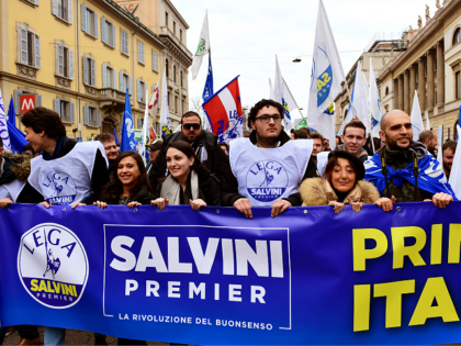 Italian far-right party Lega Nord's (Northern League) supporters hold a banner reading 'Salvini Prime Minister' as they take part in a campaign rally in downtown Milan on February 24, 2018 a week ahead of the Italy's general election. Italy stepped up security for mass demonstrations by far-right and anti-fascist groups …