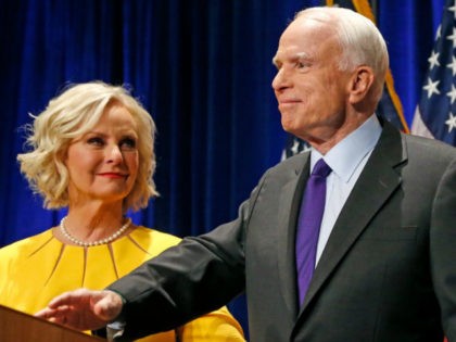 In this Nov. 8, 2016 file photo, Sen. John McCain, R-Ariz., accompanied by his wife Cindy McCain, pauses after speaking in Phoenix. A Trump administration official says that Cindy McCain is likely to take on a prominent State Department role. (AP Photo/Ross D. Franklin, File)