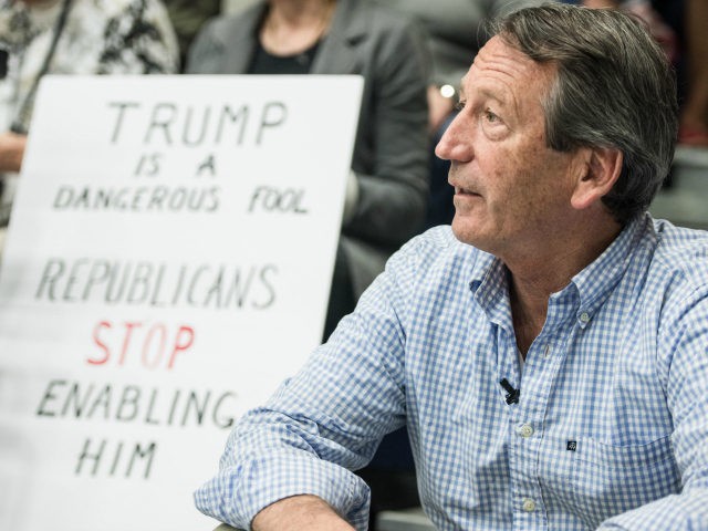 Rep. Mark Sanford (R-SC) waits for his introduction during a town hall meeting March 18, 2