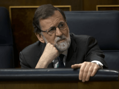 Spain’s Prime Minister Mariano Rajoy and Popular Party leader listens to speeches during the first day of a motion of no confidence session at the Spanish parliament in Madrid, Thursday, May 31, 2018. The lower house of the Spanish parliament is debating whether to end Prime Minister Mariano Rajoy’s close …