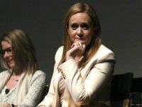 Sambeestatefarm1 Writer Jo Miller and TV Host Samantha Bee speak on stage during panel discussion for Tribeca Tune In: Full Frontal With Samanta Bee at SVA Theatre 1 on April 19, 2016 in New York City. (Photo by Astrid Stawiarz/Getty Images for Tribeca Film Festival)