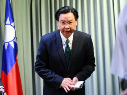 Taiwan Foreign Minister Joseph Wu arrives during a press conference in Taipei on May 1, 2018. - Taiwan said it was 'deeply upset' after the Dominican Republic, one of its few remaining official allies, established diplomatic relations with China and cut ties with the island. (Photo by SAM YEH / …