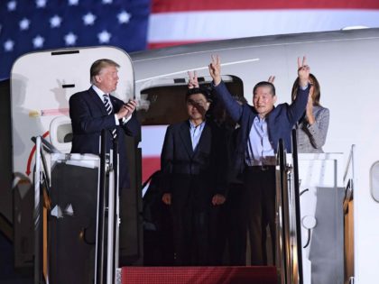 Trump welcomes Americans home (Saul Loeb / AFP / Getty)