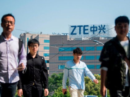 The ZTE logo is seen on an office building in Shanghai on May 3, 2018. - Senior US officials arrive in Beijing for trade talks with China, as both sides dampen expectations for a quick resolution to the heated dispute between the world's two largest economies. (Photo by Johannes EISELE …