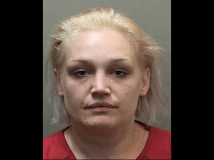 BLOOMINGTON, Ill. – A woman who was busted with ecstasy and heroin, but a cavity search