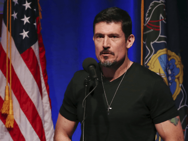 Former Army Ranger, Kris “Tonto” Paronto speaks to a gathering, about his experience i