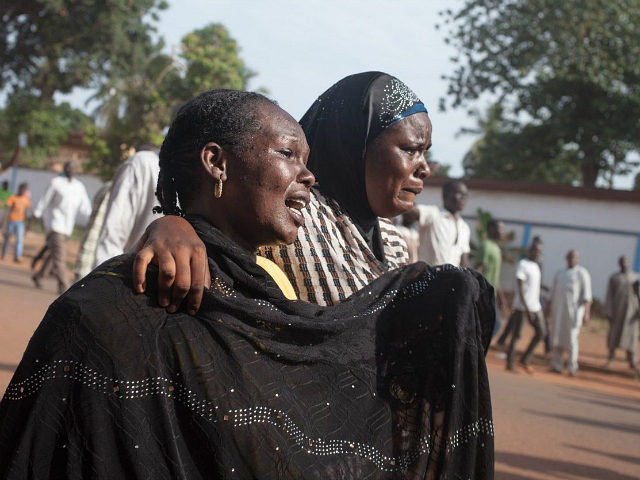 Women react as inhabitants of the mainly Muslim PK5 neighbourhood demonstrate in front of the headquarters of MINUSCA, the UN peacekeeping mission in the Central Africa Republic, in Bangui, on April 11, 2018. A United Nations peacekeeper was killed and eight others wounded April 10 in clashes with armed groups in a restive neighbourhood of the capital of the Central African Republic, a security source said. Peacekeepers from the UN's Minusca force and Central African soldiers have since April 8 been locked in an operation to rout armed groups in Bangui's mainly Muslim PK5 neighbourhood. / AFP PHOTO / FLORENT VERGNES (Photo credit should read FLORENT VERGNES/AFP/Getty Images)