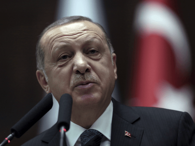 Turkish President Recep Tayyip Erdogan addresses the members of his ruling party at the pa