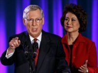 mitch-mcconnell-elaine-chao-11-4-2014-ap FILE - In this Nov. 4, 2014 file phot, Senate Minority Leader Mitch McConnell of Ky., joined by his wife, former Labor Secretary Elaine Chao, celebrates with his supporters at an election night party in Louisville, Ky. President Barack Obama has the upper hand in the fierce struggle over immigration …