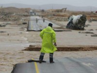 oman-highway-flooded-cyclone-mekunu-ap An Omani civil defence staff visits a road which has been cut by the flood water after Cyclone Merkunu in Salalah, Oman, Saturday, May 26, 2018. Cyclone Merkunu blew into the Arabian Peninsula on Saturday, drenching arid Oman and Yemen with rain, cutting off power lines and leaving at least …