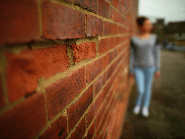 ROTHERHAM, ENGLAND - SEPTEMBER 03: (EDITORS NOTE: This image was processed using digital filters.) A teenage girl, who claims to be a victim of sexual abuse and alleged grooming, poses in Rotherham on September 3, 2014 in Rotherham, England. South Yorkshire Police have launched an independent investigation into its handling …