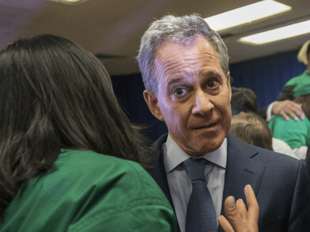 New York Attorney General Eric Schneiderman and U.S. Rep. Carolyn Maloney (D-NY) exit a pr