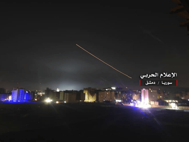 This photo provided early Thursday, May 10, 2018, by the government-controlled Syrian Central Military Media, shows missiles rise into the sky as Israeli missiles hit air defense position and other military bases, in Damascus, Syria. The Israeli military on Thursday said it attacked "dozens" of Iranian targets in neighboring Syria …