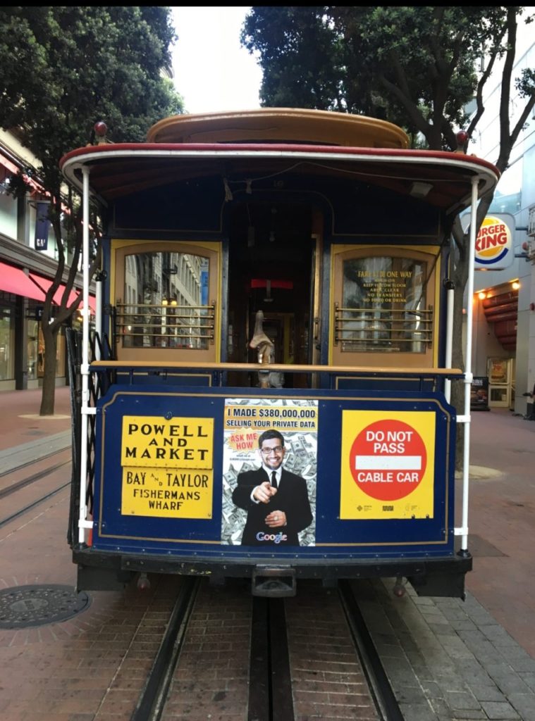 Sabo art mocking Google's CEO on a trolley