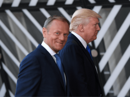 European Council President Donald Tusk (front C) welcomes US President Donald Trump (rear C) upon his arrival at EU headquarters, as part of the NATO meeting, in Brussels, on May 25, 2017. / AFP PHOTO / Emmanuel DUNAND (Photo credit should read EMMANUEL DUNAND/AFP/Getty Images)