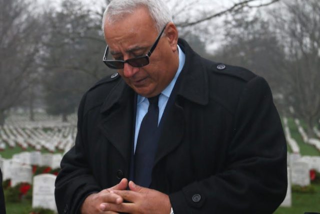 Assyrian Christian leader Emmanuel Youkhana prays for the souls of Americans killed in Iraq in Arlington National Cemetery in 2016