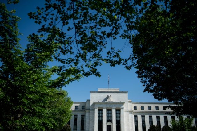 Federal Reserve leaves key interest rate unchanged, notes rising inflation