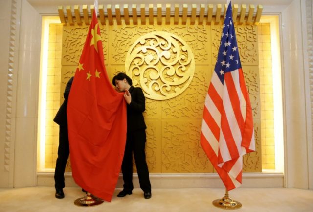 US, China dampen expectations as trade talks open