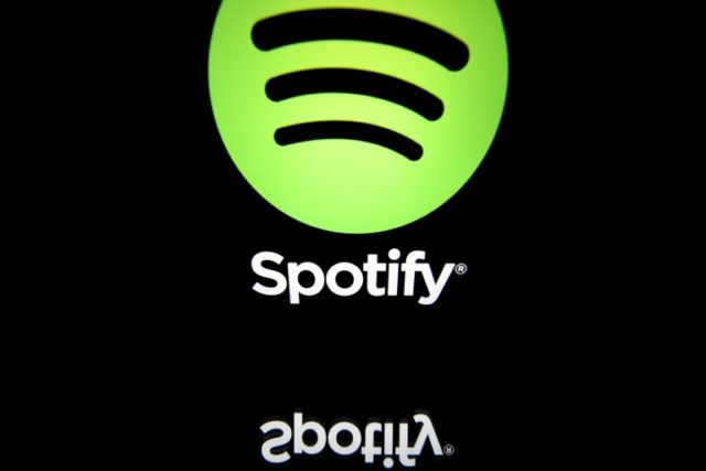 Spotify narrows losses as subscribers grow