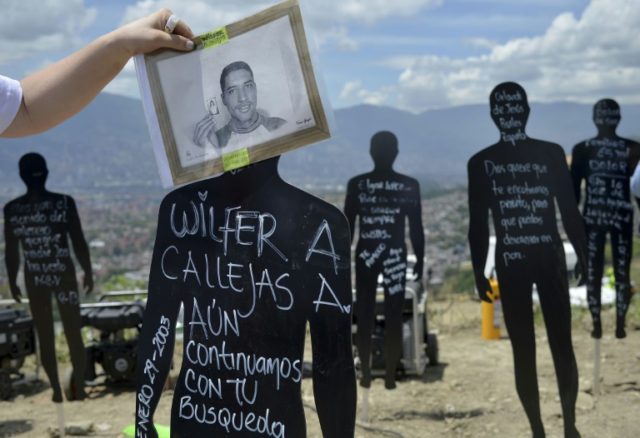 Colombia exhumes remains of 9,000 victims of paramilitary violence
