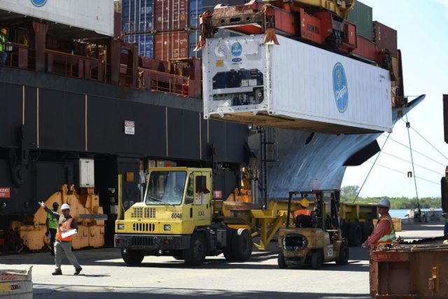 US trade deficit narrows in March on record exports