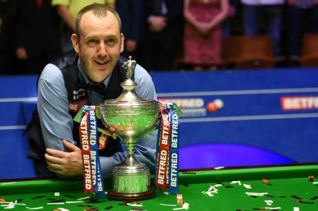 Williams rolls back years to claim third world snooker title