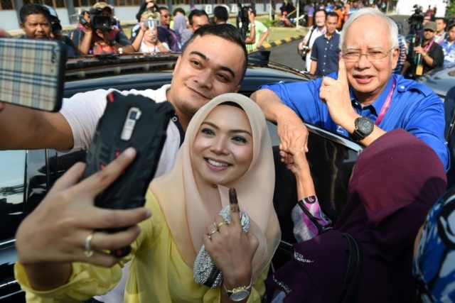 Malaysia's Mahathir says confident of victory after early unofficial results