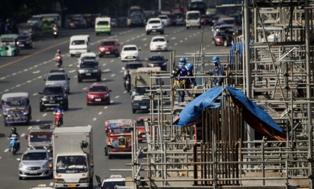 Philippine economic growth surges, central bank hikes rates