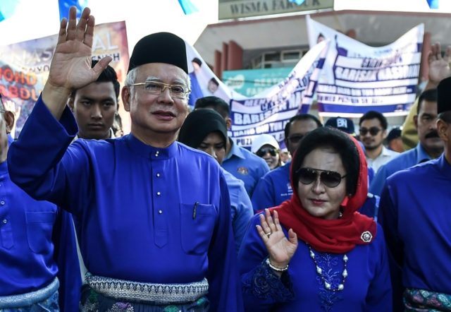 Malaysia's scandal-mired Najib hit with travel ban after poll loss