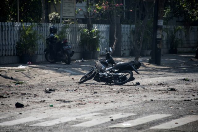 At least two dead, 13 injured in Indonesia church attacks: police