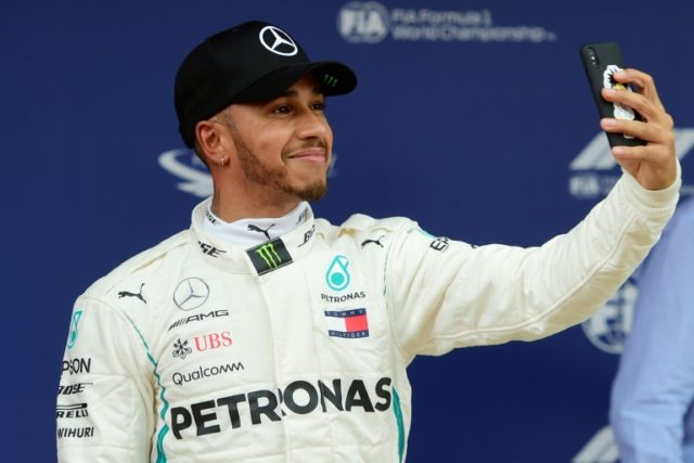 "I needed that," says selfie-taking Hamilton after record Spanish pole