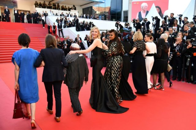 'Let's climb!' Female stars call for equal pay in Cannes protest