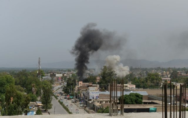 At least nine dead after bomb, gun battle in Afghan city