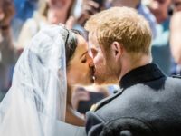 The royal newlyweds kissed in front of the Windsor crowds The royal newlyweds kissed in front of the Windsor crowds
