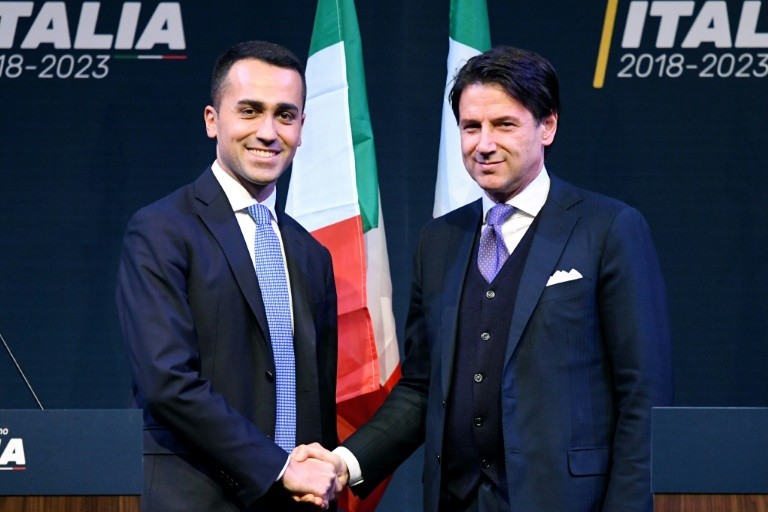 Leader of Italy's populist Five Star Movement Luigi Di Maio had named Giuseppe Conte, seen on the right, as one of his ministers in March, with the press speculating he will be named prime minister