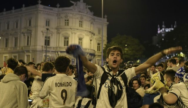 Real Madrid parade Champions League trophy in front of ecstatic fans