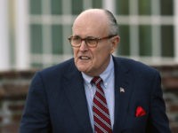 Trump Porn Star Rudy Giuliani In this Nov. 20, 2016 file photo, former New York Mayor Rudy Giuliani arrives at the Trump National Golf Club Bedminster clubhouse in Bedminster, N.J. President Donald Trump's new lawyer Rudy Giuliani said Wednesday, May 2, 2018, the president repaid attorney Michael Cohen for a $130,000 payment to porn star Stormy Daniels. Giuliani made the revelation during an appearance on Fox News Channel's "Hannity." (AP Photo/Carolyn Kaster, File) Rudy Giuliani