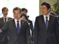 Japan South Korea Moon Jae in, Shinzo Abe South Korea's President Moon Jae in, left, is greeted by Japan's Prime Minister Shinzo Abe, right, prior to their meeting at Abe's official residence in Tokyo Wednesday, May 9, 2018. (Kazuhiro Nogi/Pool Photo via AP) The Associated Press