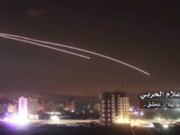 Syria This photo provided early Thursday, May 10, 2018, by the government controlled Syrian Central Military Media, shows missiles rise into the sky as Israeli missiles hit air defense position and other military bases, in Damascus, Syria. The Israeli military on Thursday said it attacked "dozens" of Iranian targets in neighboring Syria in response to an Iranian rocket barrage on Israeli positions in the Golan Heights, in the most serious military confrontation between the two bitter enemies to date. (Syrian Central Military Media, via AP) The Latest: Russia: Syria downed half of Israel's missiles