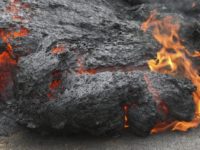 Hawaii Volcano The Lava File In this May 5, 2018, file photo, lava burns across a road in the Leilani Estates subdivision near Pahoa, Hawaii. The lava hisses, crackles and pops. It roars like an engine as it sloshes and bubbles. It shoots into the sky, bright orange and full of danger, or oozes along the pavement, a giant bubbling blob of black marshmallow like fluff, crushing homes and making roads impassable. (AP Photo/Caleb Jones, File) The Associated Press