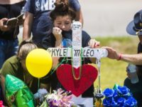 School Shooting Texas A young woman cries, Tuesday, May 22, 2018, by a memorial for Santa Fe High School freshman Aaron Kyle McLeod who was killed Friday during a shooting at the school, in Santa Fe, Texas. (Marie D. De Jesus/Houston Chronicle via AP) A young woman cries, Tuesday, May 22, 2018, by a memorial for Santa Fe High School freshman Aaron Kyle McLeod who was killed Friday during a shooting at the school, in Santa Fe, Texas. (Marie D. De Jesus/Houston Chronicle via AP)