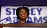 Georgia Primary Governor Stacey Abrams Democratic candidate for Georgia Governor Stacey Abrams smiles as she speaks during an election night watch party Tuesday, May 22, 2018, in Atlanta. (AP Photo/John Bazemore) Stacey Abrams