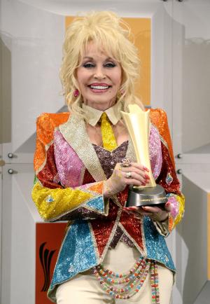 Dolly Parton pays surprise visit to senior center, renames facility