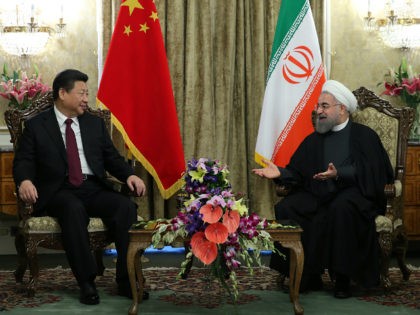 TEHRAN, IRAN - JANUARY 23 : Chinese President Xi Jinping (L) and Iranian President Hassan Rouhani (R) pose during a meeting at Saadabad Palace in Tehran, Iran on January 23, 2016. (Photo by Pool / Iranian Presidency/Anadolu Agency/Getty Images)