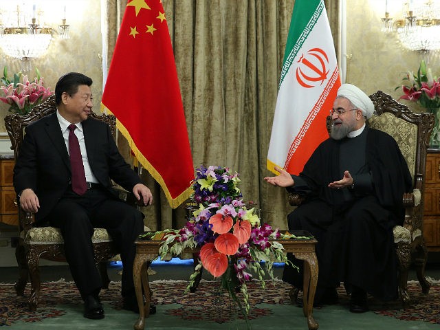 TEHRAN, IRAN - JANUARY 23 : Chinese President Xi Jinping (L) and Iranian President Hassan