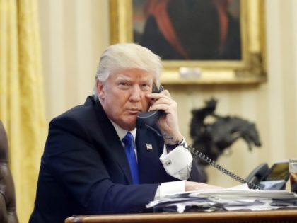 FILE - In this Jan. 28, 2017, file photo, U.S. President Donald Trump speaks on the phone