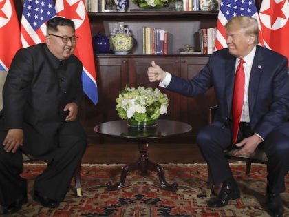 U. S. Donald Trump gives North Korea leader Kim Jong Un a thumbs up at their meeting at the Capella resort on Sentosa Island Tuesday, June 12, 2018 in Singapore. (AP Photo/Evan Vucci)