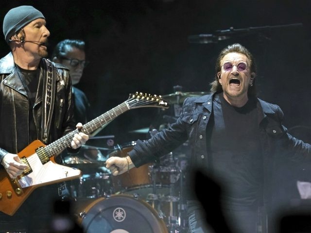 Guitarist The Edge, left, and singer Bono, of the band U2, perform on stage during their &
