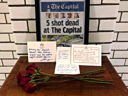 At the State House, letters and flowers form a memorial Friday, June 29, 2018, in Annapolis, Md., from Gov. Larry Hogan, state Senate President Thomas V. Mike Miller and House Speaker Michael Busch at the state house. The memorial is for the five dead members of the Capitol Gazette who …